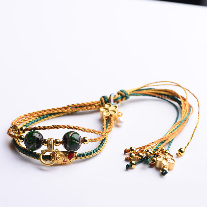 Bracelet de guérison multicouche tressé en perles de verre Liuli en corde tibétaine faite à la main avec Buddha Stones
