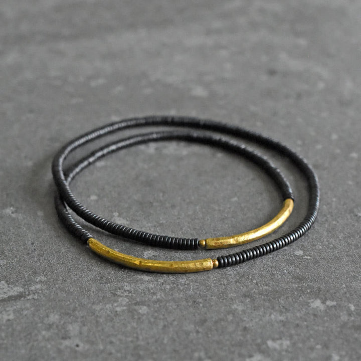 Bracelet multicouches en bois d'ébène et cuivre avec Buddha Stones