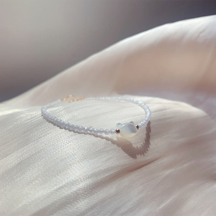 Bracelet de guérison en pierre tridacna avec spinelle noire et cristal blanc plaqué or 14 carats de Buddha Stones - image 15