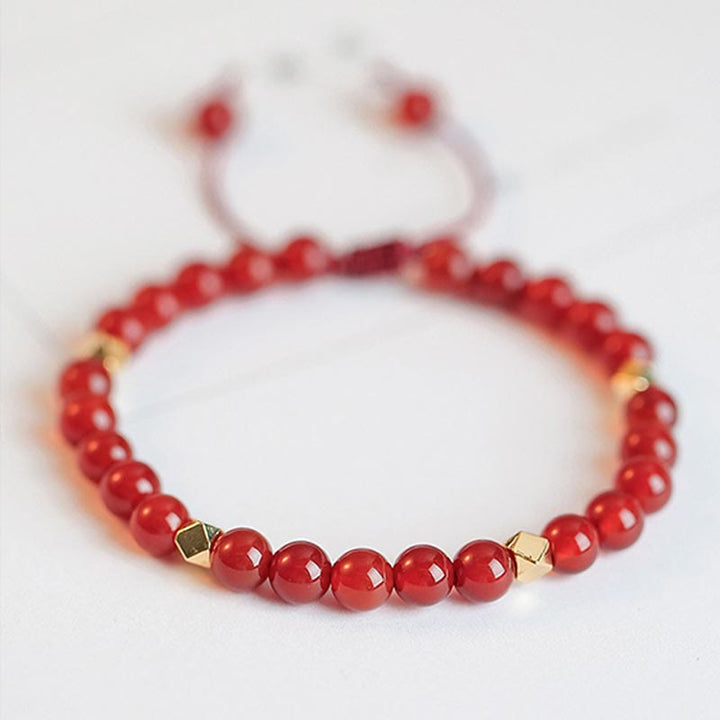Bracelet de confiance en forme d'étoile à quatre feuilles en agate rouge naturelle avec nœud sans fin
