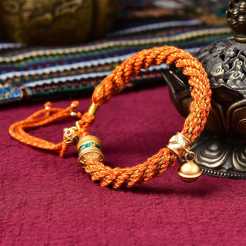 Bracelet tibétain fait main avec breloque en corde tressée et roue de prière Thangka pour protection de la chance