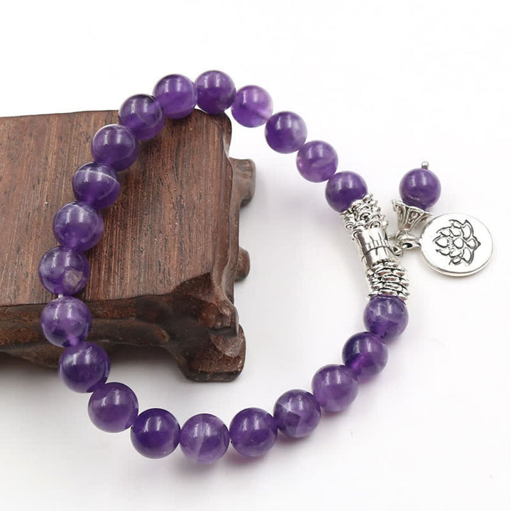 Bracelet d'équilibre et de guérison en cristal d'améthyste et de lotus en Buddha Stones