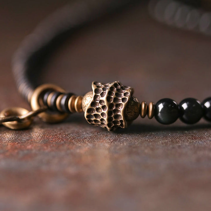 Bracelet multicouche positif en cuivre et bois d'ébène avec Buddha Stones arc-en-ciel obsidienne