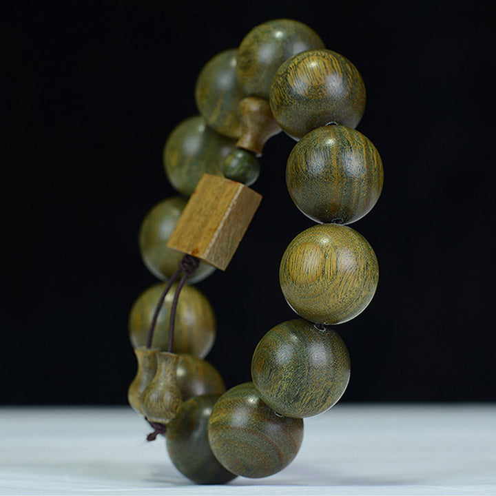 Bracelet de guérison tibétain en bois de santal vert Buddha Stones - image 4