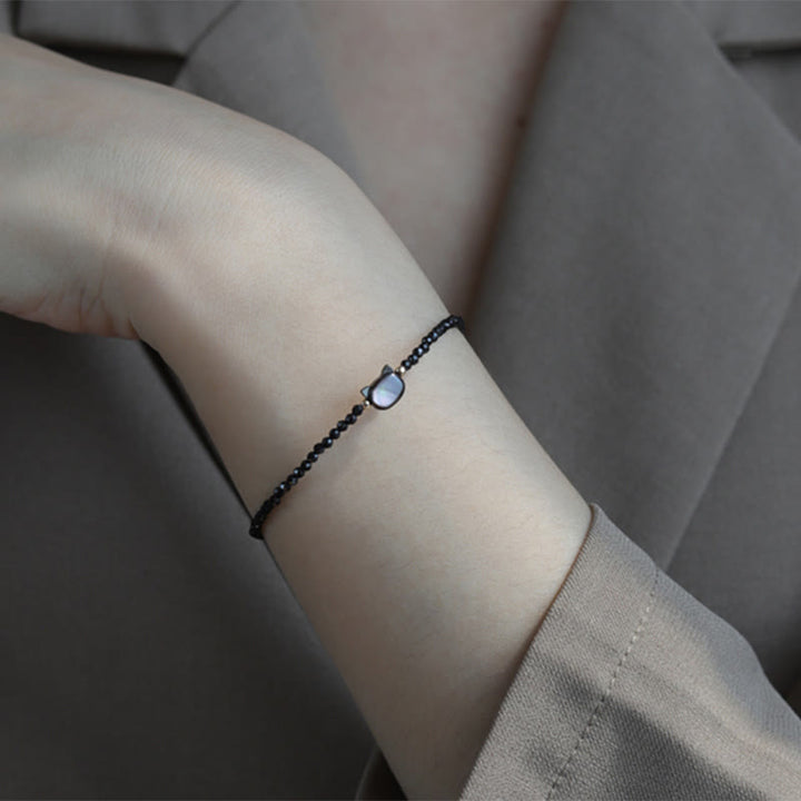 Bracelet de guérison en pierre tridacna avec spinelle noire et cristal blanc plaqué or 14 carats de Buddha Stones - image 4