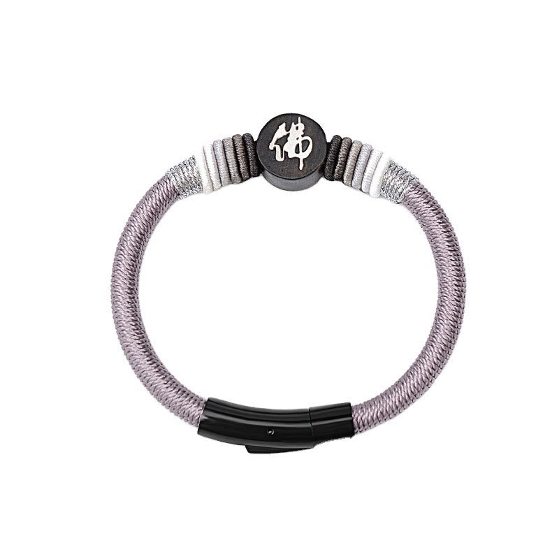 Bracelet en corde fait main en ébène avec personnage de Bouddha de Buddha Stones