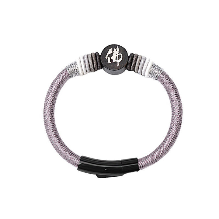 Bracelet en corde fait main en ébène avec personnage de Bouddha de Buddha Stones
