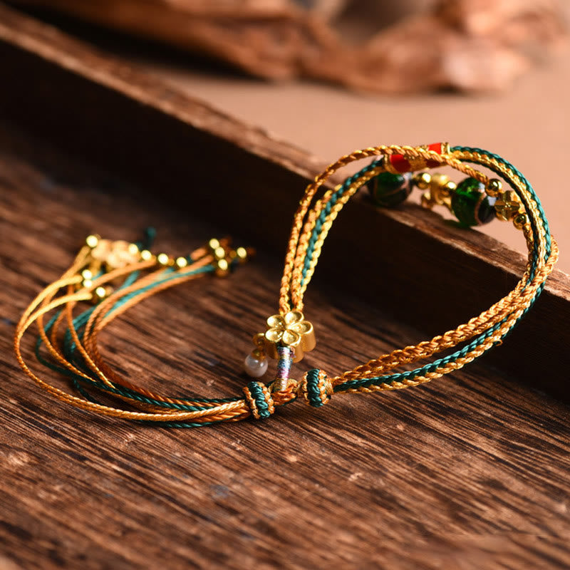 Bracelet de guérison multicouche tressé en perles de verre Liuli en corde tibétaine faite à la main avec Buddha Stones