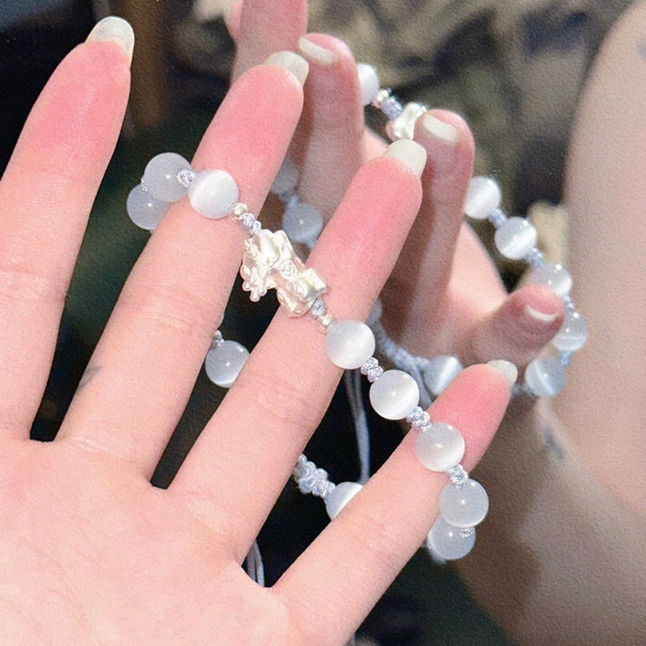 Bracelet de force PiXiu en obsidienne noire naturelle œil de chat et cristal rose Buddha Stones