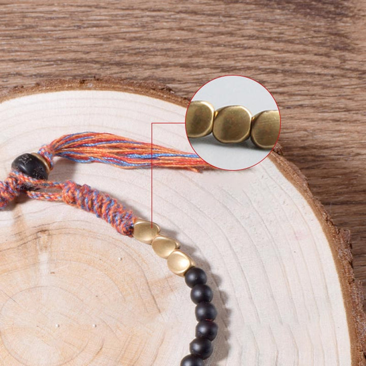 Bracelet à pampilles en onyx noir tibétain fait main avec Buddha Stones