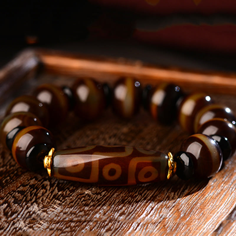 Bracelet tibétain en agate naturelle à neuf yeux avec perles dzi et Buddha Stones