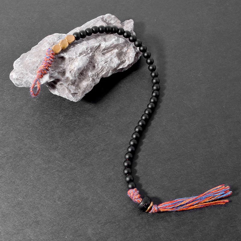 Bracelet à pampilles en onyx noir tibétain fait main avec Buddha Stones