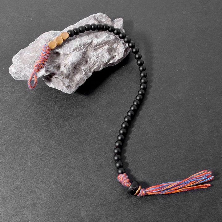 Bracelet à pampilles en onyx noir tibétain fait main avec Buddha Stones