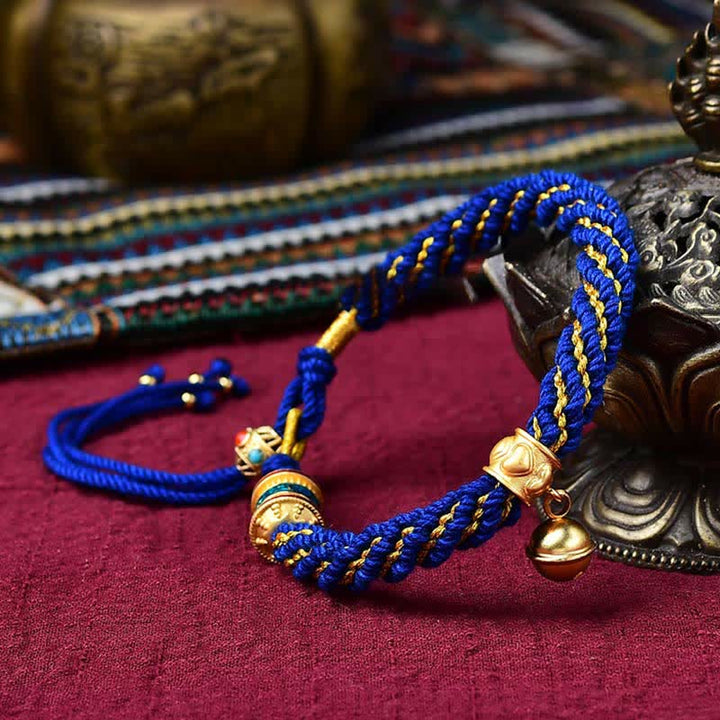 Bracelet tibétain fait main avec breloque en corde tressée et roue de prière Thangka pour protection de la chance