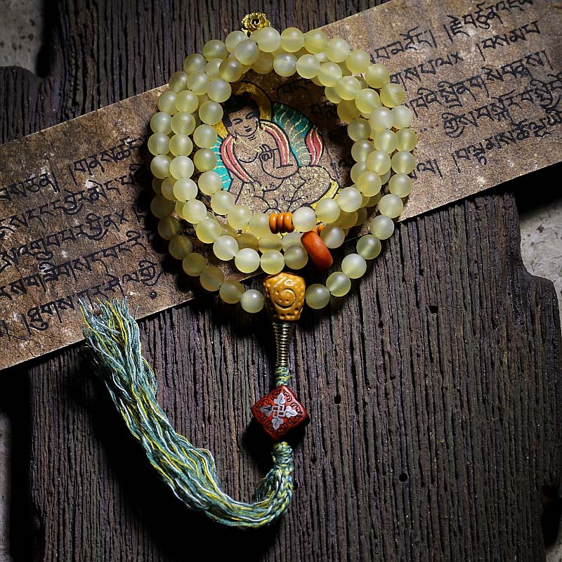 Bracelet porte-bonheur en ambre avec 108 Buddha Stones de Mala en corne de mouton du Tibet