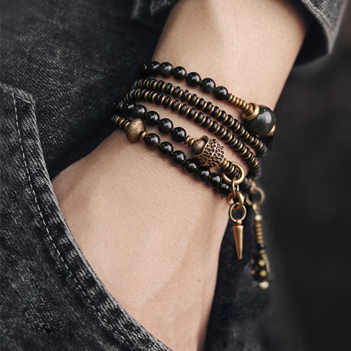 Bracelet multicouche positif en cuivre et bois d'ébène avec Buddha Stones arc-en-ciel obsidienne