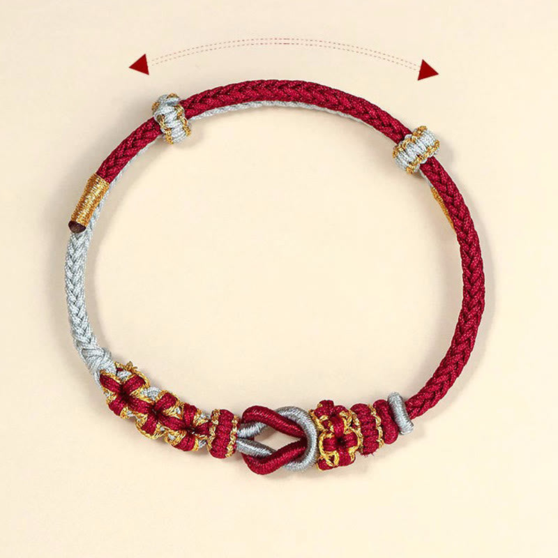 Bracelet de protection porte-bonheur fait main en Buddha Stones avec nœud en fleur de pêcher à huit fils