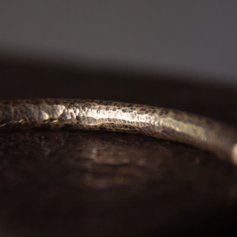 Bracelet manchette ajustable en cuivre au design rustique avec Buddha Stones