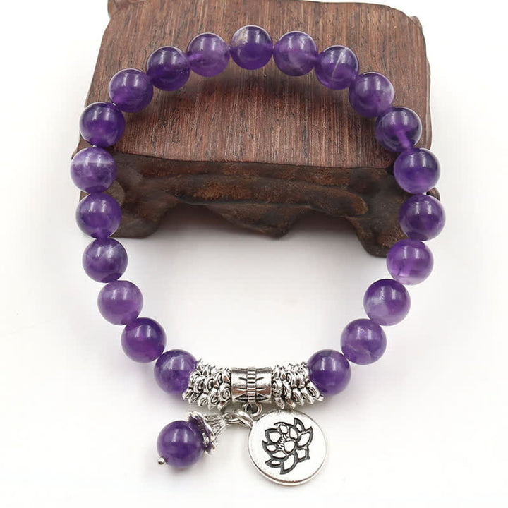 Bracelet d'équilibre et de guérison en cristal d'améthyste et de lotus en Buddha Stones