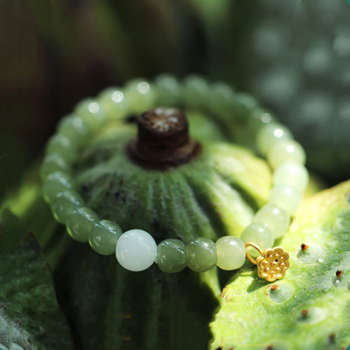 Bracelet ajustable en jade et lotus d'abondance