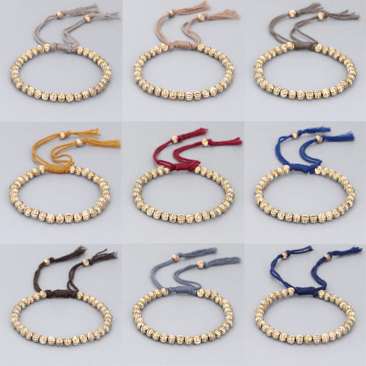 Bracelet porte-bonheur en perles de cuivre tibétaines faites à la main avec Buddha Stones