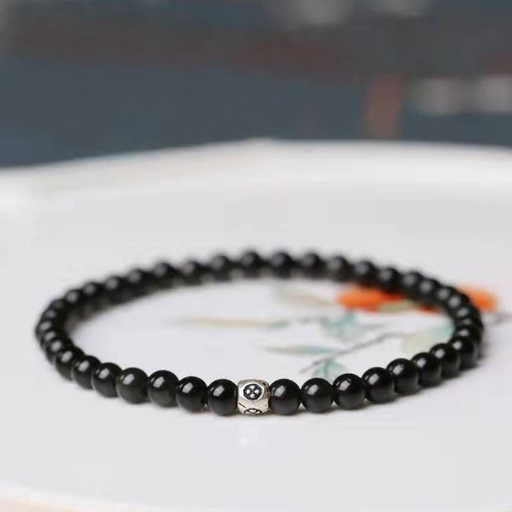 Bracelet de force de purification en obsidienne noire naturelle et quartz fumé de Buddha Stones