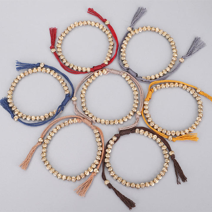 Bracelet porte-bonheur en perles de cuivre tibétaines faites à la main avec Buddha Stones