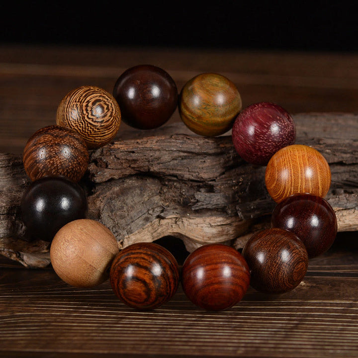 Bracelet de guérison et de protection en bois de santal multicolore Buddha Stones