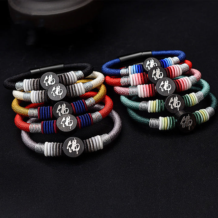 Bracelet en corde fait main en ébène avec personnage de Bouddha de Buddha Stones