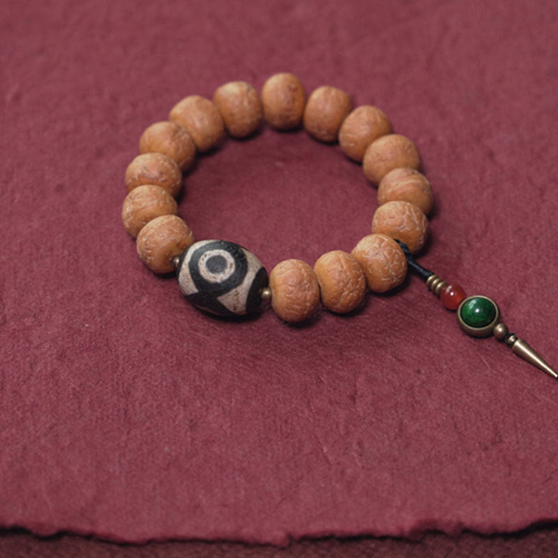 Bracelet Mala en perles de graines de Bodhi Dzi en pierres de Buddha Stones tibétaines avec breloque de paix