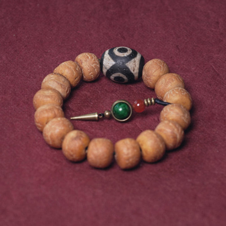 Bracelet Mala en perles de graines de Bodhi Dzi en pierres de Buddha Stones tibétaines avec breloque de paix