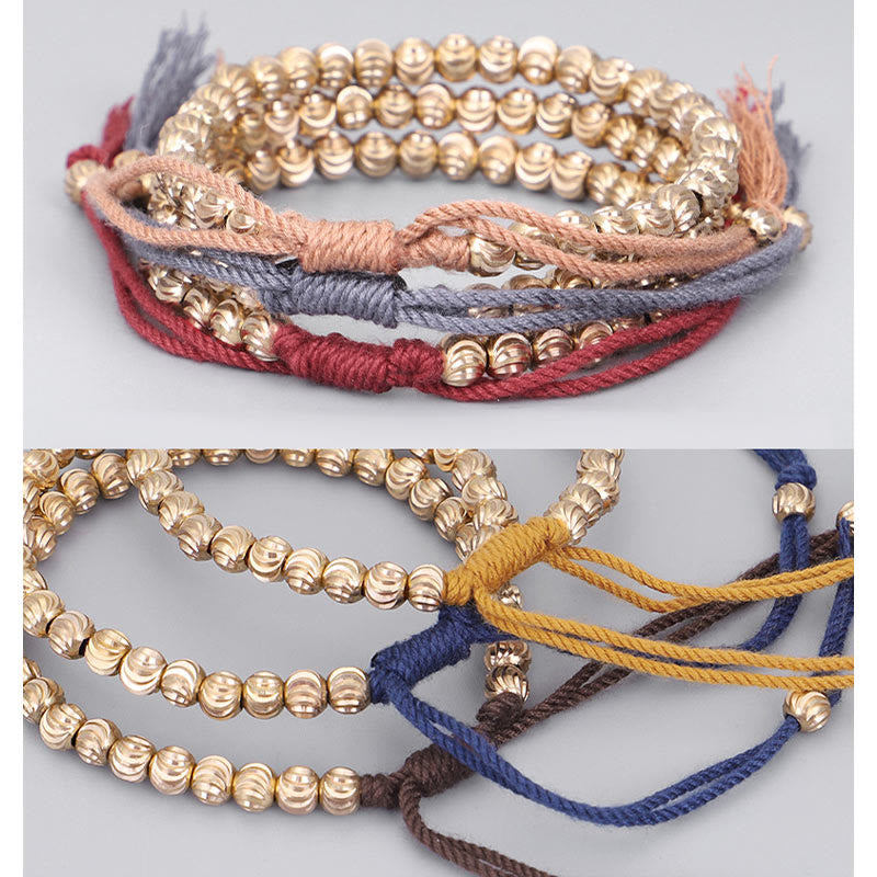 Bracelet porte-bonheur en perles de cuivre tibétaines faites à la main avec Buddha Stones