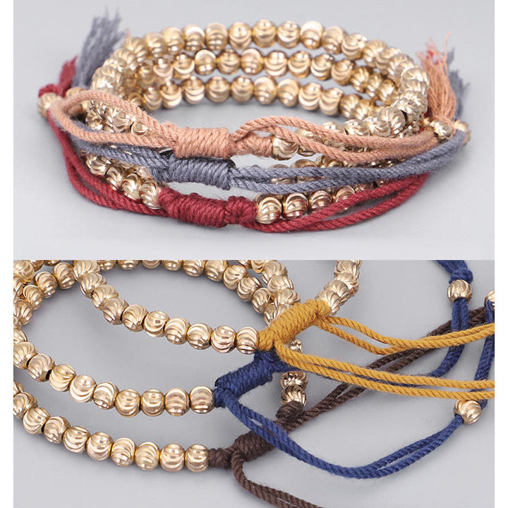 Bracelet porte-bonheur en perles de cuivre tibétaines faites à la main avec Buddha Stones