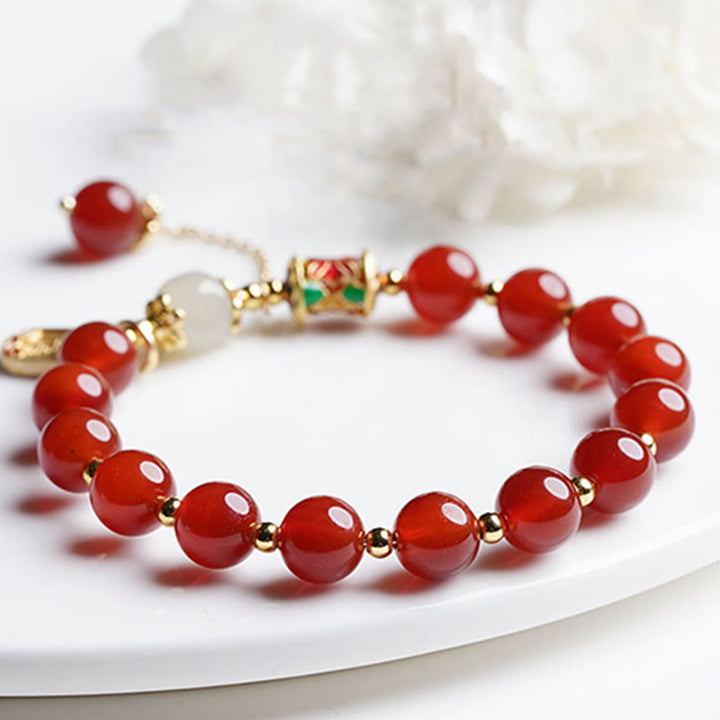 Bracelet à breloques en jade Hetian rouge naturel avec Buddha Stones et caractère Fu