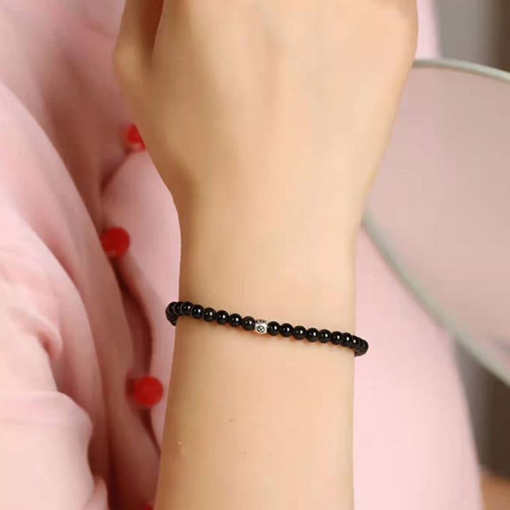 Bracelet de force de purification en obsidienne noire naturelle et quartz fumé de Buddha Stones