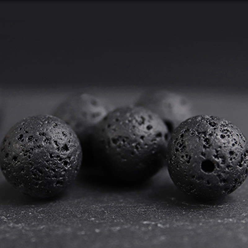 Bracelet de guérison en pierre de lave et bois d'ébène avec œil de tigre