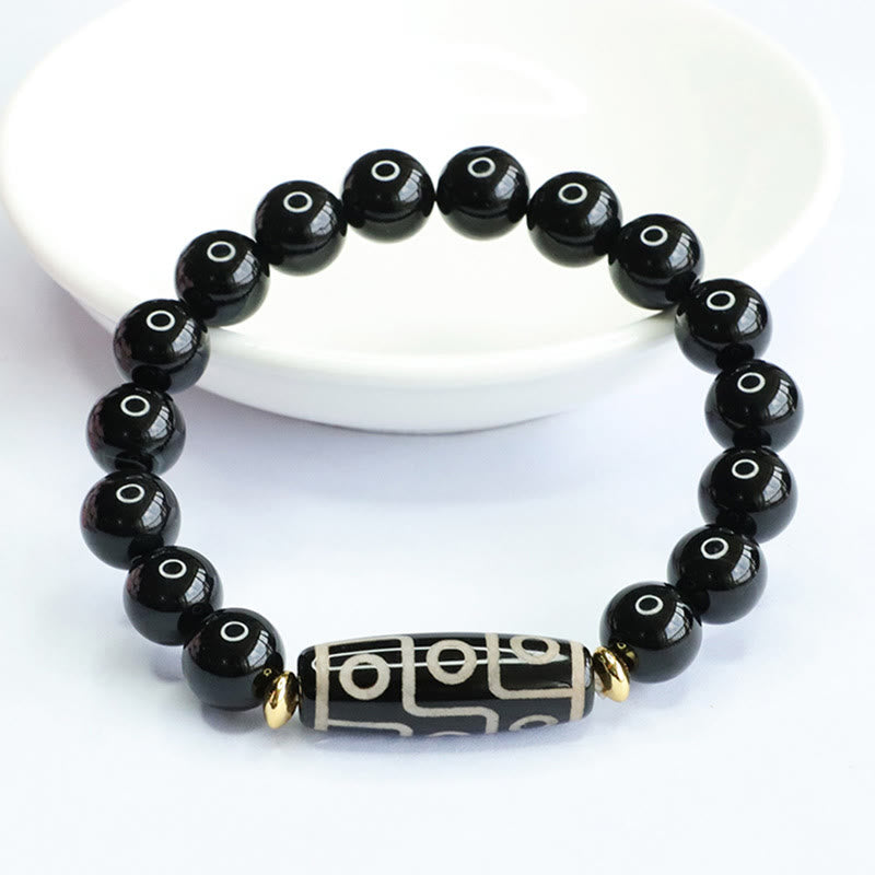 Bracelet de puissance tibétain en onyx noir avec perles dzi à neuf yeux et Buddha Stones
