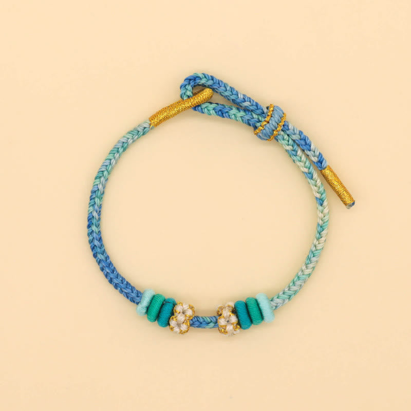 Bracelet tressé fait main en corde porte-bonheur avec nœud de paix à huit fils et nœud de fleur de pêcher en Buddha Stones - image 11