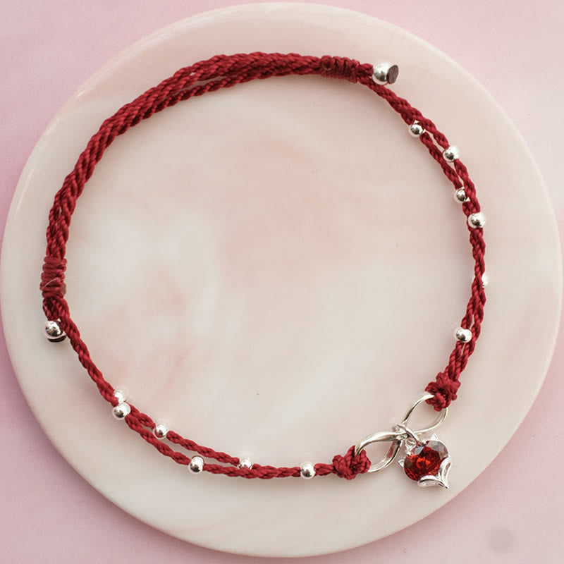 Bracelet de cheville tressé avec symbole de l'infini et du cœur en Buddha Stones