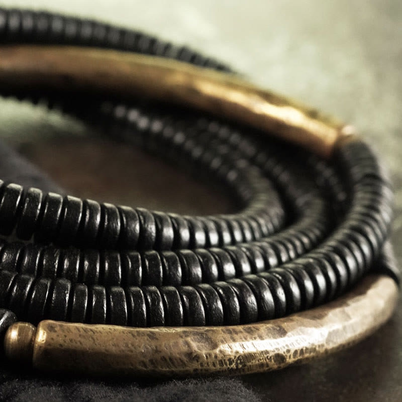 Bracelet multicouches en bois d'ébène et cuivre avec Buddha Stones