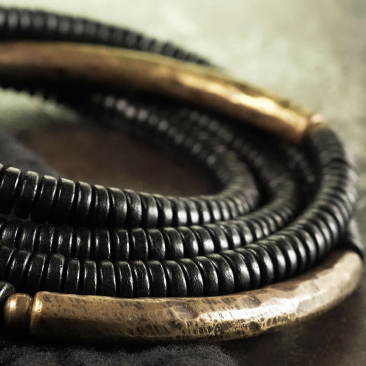 Bracelet multicouches en bois d'ébène et cuivre avec Buddha Stones