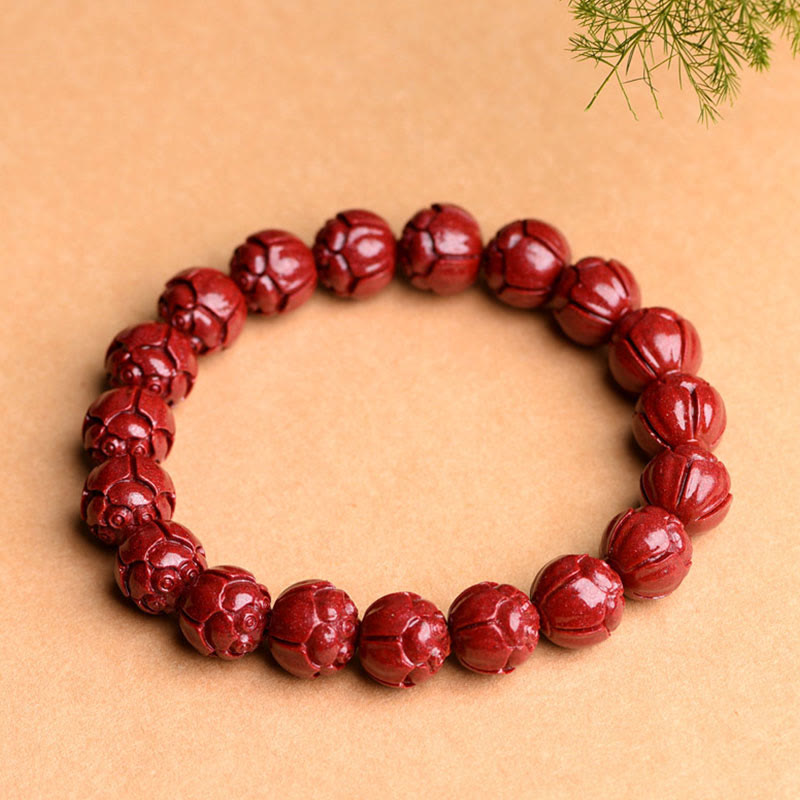 Bracelet de bénédiction de lotus à motif de frette en Buddha Stones en cinabre naturel Om Mani Padme Hum