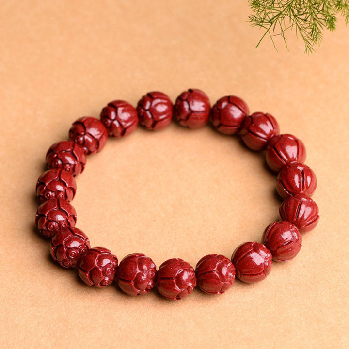 Bracelet de bénédiction de lotus à motif de frette en Buddha Stones en cinabre naturel Om Mani Padme Hum