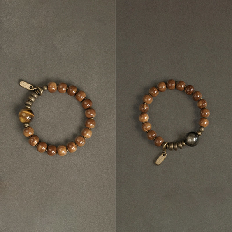 Bracelet porte-bonheur en cuivre et obsidienne dorée avec Buddha Stones de Kuka et œil de tigre