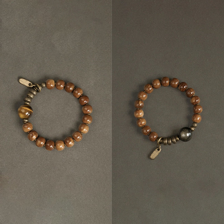 Bracelet porte-bonheur en cuivre et obsidienne dorée avec Buddha Stones de Kuka et œil de tigre
