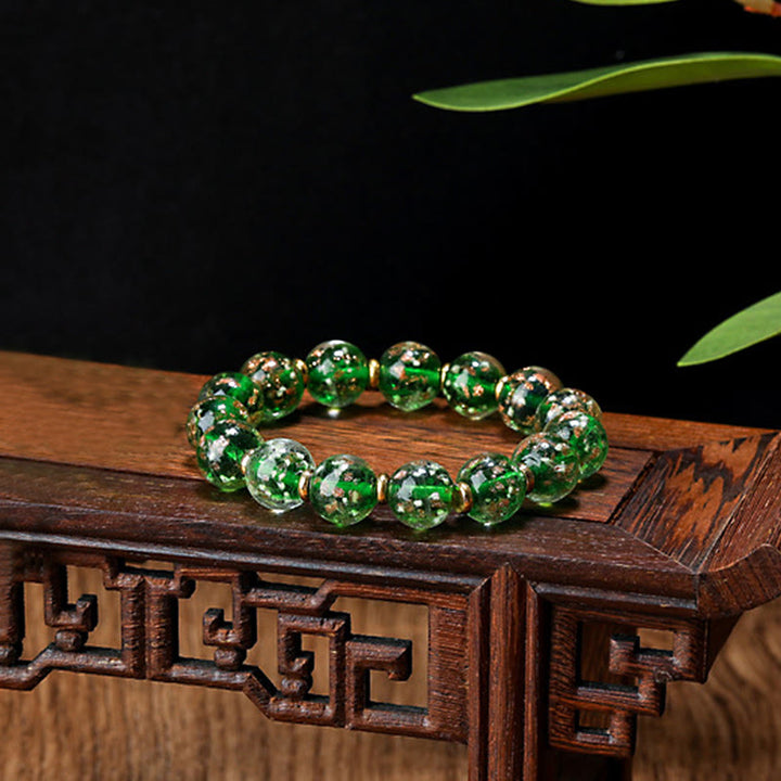 Bracelet de réussite en perles de verre Liuli fluorescentes lumineuses avec breloque de famille de bêtes avaleuses en or et Buddha Stones