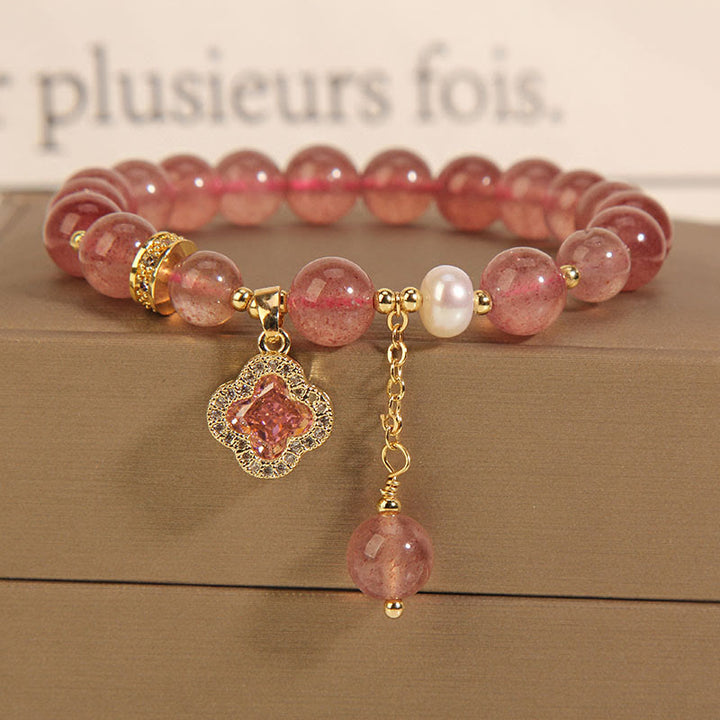 Bracelet de guérison à breloques en trèfle à quatre feuilles avec perles de quartz fraise et Buddha Stones