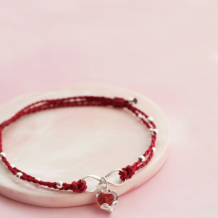 Bracelet de cheville tressé avec symbole de l'infini et du cœur en Buddha Stones