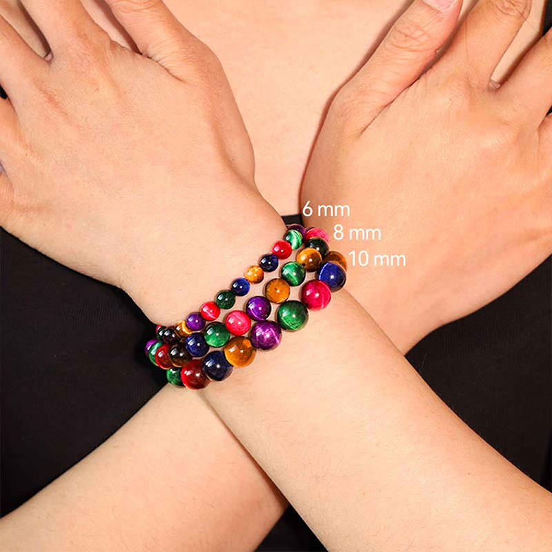 Bracelet courageux et résolu en œil de tigre avec Buddha Stones