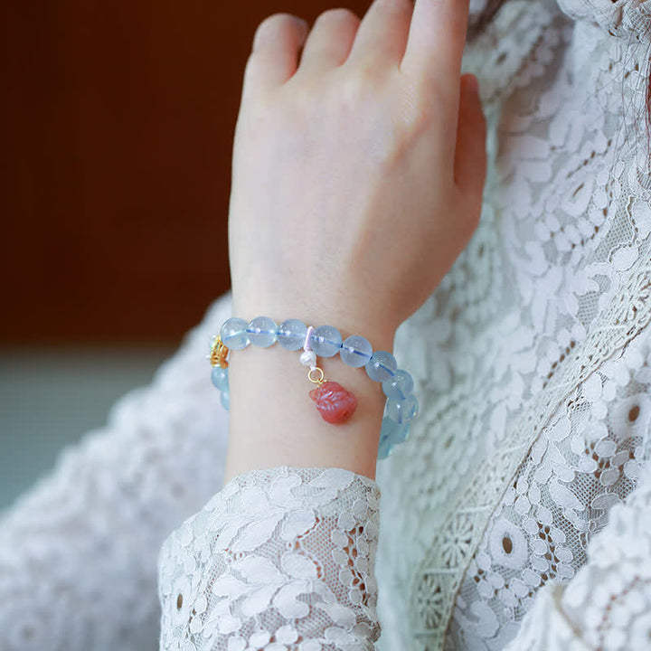 Bracelet de charme de guérison en perles d'agate rouge et aigue-marine naturelles de Buddha Stones